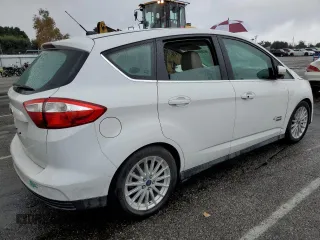 2015 Ford C-Max Energi SEL with VIN 1FADP5CU8FL101583, listed as a Copart auction lot 82705453 with 135,492 mi miles. Bid and sale history available at carsss.com. Image 3.