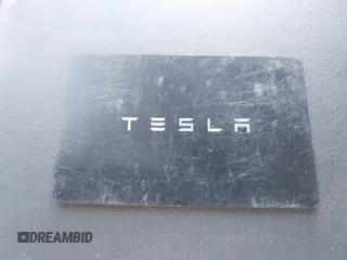 2024 Tesla Model Y z VIN 7SAYGDED4RF115252, wystawiony jako IAAI lot #42302658 z przebiegiem 7 365 mil mil oraz . Historia ofert i sprzedaży dostępna na DreamBid. Obrazek 11.