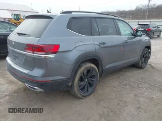 2021 Volkswagen Atlas SE z VIN 1V2KR2CA0MC570498, wystawiony jako IAAI lot #41807676 z przebiegiem 56 434 mil mil oraz . Historia ofert i sprzedaży dostępna na DreamBid. Obrazek 4.