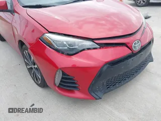 2017 Toyota Corolla L z VIN 5YFBURHE9HP610157, wystawiony jako IAAI lot #40999523 z przebiegiem 185 454 mil mil oraz . Historia ofert i sprzedaży dostępna na DreamBid. Obrazek 17.