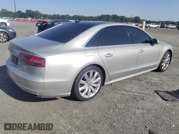 2017 Audi A8 with VIN WAU44AFD3HN014802, listed as a IAAI auction lot 42573537 with 121,096 mi miles and . Bid and sale history available at DreamBid. Image 4.