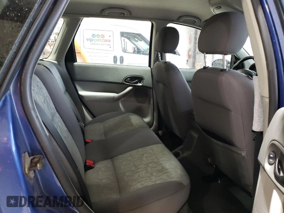 2005 Ford Focus SE with VIN 1FAHP36N65W187161, listed as a Copart auction lot 52024045 with 261,194 mi miles and Salvage Title. Bid and sale history available at carsss.com. Image 11.