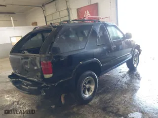 2001 Chevrolet Blazer LS with VIN 1GNCS18W51K260297, listed as a IAAI auction lot 41697909 with 144,564 mi miles. Bid and sale history available at carsss.com. Image 4.