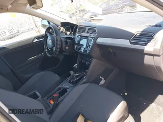 2018 Volkswagen Tiguan S z VIN 3VV1B7AX5JM043090, wystawiony jako IAAI lot #41998165 z przebiegiem Nie podano mil oraz . Historia ofert i sprzedaży dostępna na DreamBid. Obrazek 5.