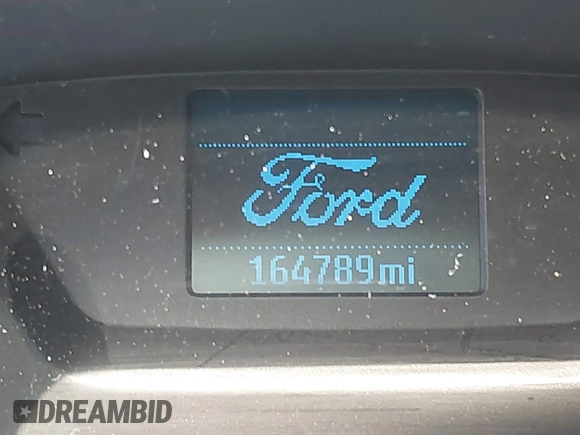 2018 Ford Transit with VIN 1FTYE1YM4JKA83438, listed as a IAAI auction lot 39881520 with 164,789 mi miles and . Bid and sale history available at carsss.com. Image 15.