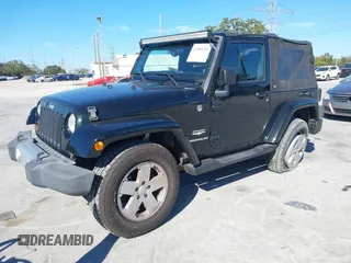 2012 Jeep Wrangler Arctic with VIN 1C4AJWBG7CL170079, listed as a IAAI auction lot 41004260 with 83,408 mi miles and . Bid and sale history available at DreamBid. Image 2.