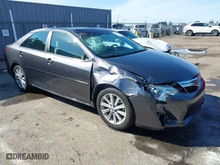 2013 Toyota Camry Hybrid LE with VIN 4T1BD1FK0DU085797, listed as a IAAI auction lot 41839858 with 85,818 mi miles. Bid and sale history available at carsss.com. Image 1.