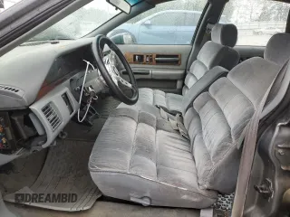 1991 Chevrolet Caprice z VIN 1G1BN53E1MW223013, wystawiony jako Copart lot #49857604 z przebiegiem 224 278 mil mil oraz Szkoda całkowita • Salvage title. Historia ofert i sprzedaży dostępna na DreamBid. Obrazek 7.