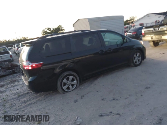 2015 Toyota Sienna LE AAS with VIN 5TDKK3DC2FS685245, listed as a IAAI auction lot 41849185 with 141,545 mi miles. Bid and sale history available at carsss.com. Image 4.