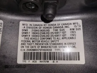 2015 Honda CR-V EX-L with VIN 2HKRM4H75FH604059, listed as a IAAI auction lot 41869535 with 131,848 mi miles. Bid and sale history available at carsss.com. Image 9.