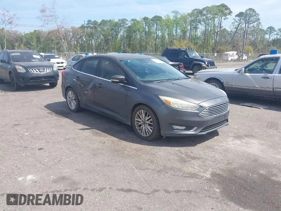 2015 Ford Focus Titanium with VIN 1FADP3J24FL277732, listed as a IAAI auction lot 41903397 with 238,138 mi miles and . Bid and sale history available at carsss.com. Image 1.