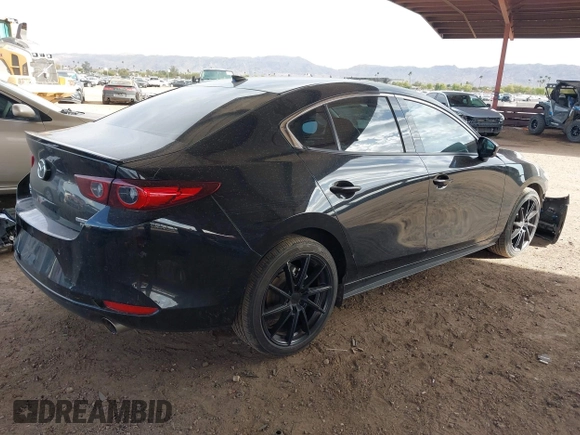 2023 Mazda 3 Premium Plus with VIN 3MZBPBEY6PM350056, listed as a IAAI auction lot 41940111 with 27,091 mi miles and . Bid and sale history available at DreamBid. Image 4.