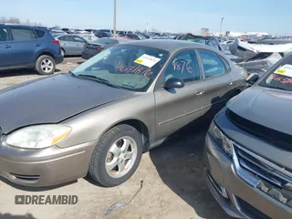 2004 Ford Taurus SE with VIN 1FAFP532X4G152810, listed as a IAAI auction lot 41639876 with 98,718 mi miles and . Bid and sale history available at DreamBid. Image 14.