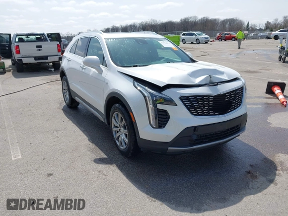 2020 Cadillac XT4 AWD Premium Luxury z VIN 1GYFZDR44LF036461, wystawiony jako IAAI lot #41934371 z przebiegiem 90 545 mil mil oraz . Historia ofert i sprzedaży dostępna na DreamBid. Obrazek 1.