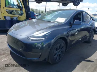 2024 Tesla Model Y Long Range with VIN 7SAYGDEE6RF127475, listed as a IAAI auction lot 41919580 with 19,395 mi miles. Bid and sale history available at carsss.com. Image 2.