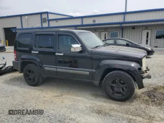 2010 Jeep Liberty Sport with VIN 1J4PN2GK3AW143682, listed as a Copart auction lot 54299555 with 137,257 mi miles and Salvage Title. Bid and sale history available at DreamBid. Image 4.