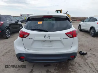 2016 Mazda CX-5 Touring with VIN JM3KE2CY1G0888850, listed as a IAAI auction lot 41562701 with 1 mi miles. Bid and sale history available at carsss.com. Image 16.