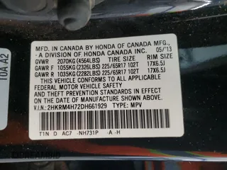 2013 Honda CR-V EX-L z VIN 2HKRM4H72DH661929, wystawiony jako Copart lot #60455455 z przebiegiem 198 637 mil mil oraz Szkoda całkowita • Salvage title. Historia ofert i sprzedaży dostępna na DreamBid. Obrazek 14.