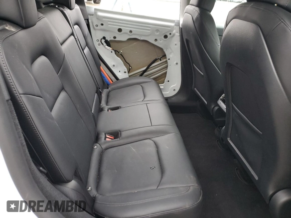 2023 Tesla Model Y Long Range z VIN 7SAYGDEE4PF836872, wystawiony jako Copart lot #45566235 z przebiegiem 7 674 mil mil oraz Szkoda całkowita • Salvage title. Historia ofert i sprzedaży dostępna na DreamBid. Obrazek 11.