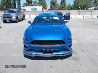 2019 Ford Mustang EcoBoost with VIN 1FA6P8TH7K5119181, listed as a IAAI auction lot 42531504 with 80,292 mi miles and . Bid and sale history available at DreamBid. Image 12.