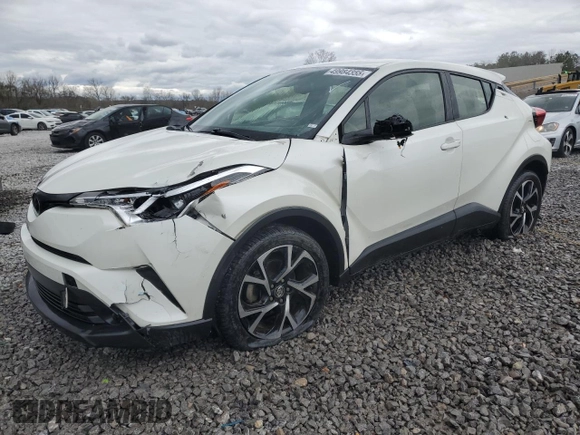 2018 Toyota C-HR XLE z VIN JTNKHMBXXJ1003871, wystawiony jako Copart lot #49984355 z przebiegiem 101 395 mil mil oraz Szkoda całkowita • Salvage title. Historia ofert i sprzedaży dostępna na DreamBid. Obrazek 1.