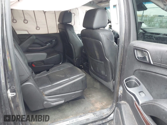 2015 GMC Yukon XL SLT with VIN 1GKS1HKC8FR219289, listed as a IAAI auction lot 40772496 with 163,477 mi miles. Bid and sale history available at carsss.com. Image 8.