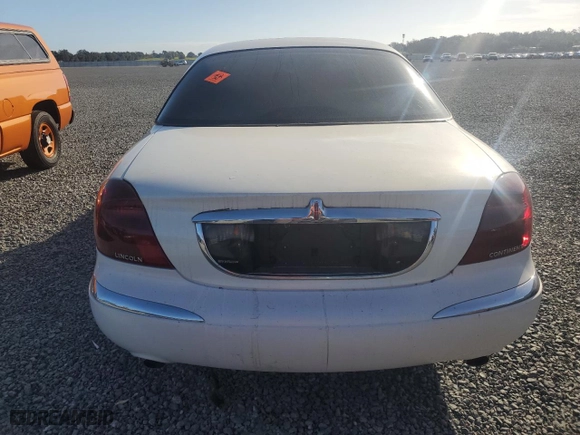 2000 Lincoln Continental with VIN 1LNHM97V0YY795279, listed as a Copart auction lot 76456684 with 0 mi miles and Salvage Title. Bid and sale history available at carsss.com. Image 6.