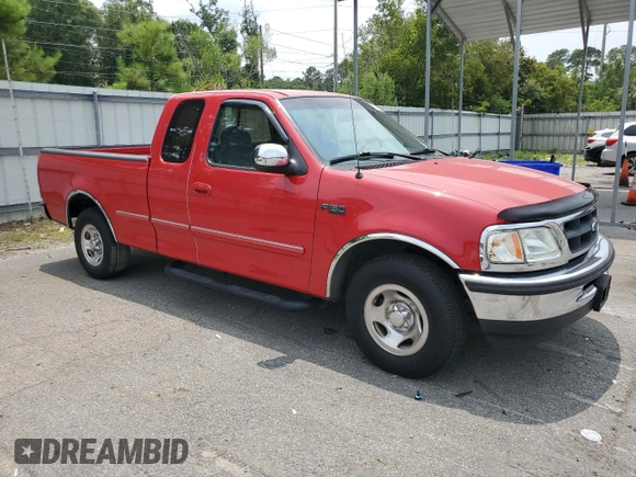 1997 Ford F-150 XL with VIN 1FTEX17L1VNB55769, listed as a Copart auction lot 58901715 with 174,234 mi miles and Salvage title. Bid and sale history available at DreamBid. Image 4.
