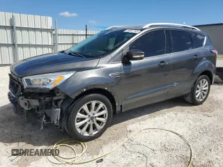 2017 Ford Escape Titanium with VIN 1FMCU0J95HUF02694, listed as a Copart auction lot 49861745 with 114,602 mi miles and Salvage Title. Bid and sale history available at DreamBid. Image 1.