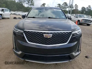 2020 Cadillac XT6 FWD Premium Luxury with VIN 1GYKPCRS6LZ102682, listed as a Copart auction lot 56906645 with 76,884 mi miles and Salvage title. Bid and sale history available at DreamBid. Image 5.