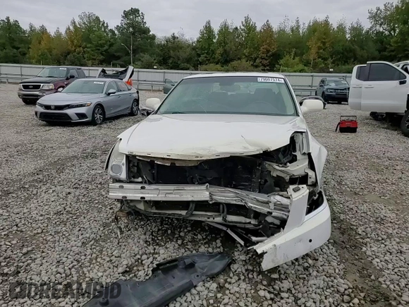 2007 Cadillac DTS Performance z VIN 1G6KD57907U171271, wystawiony jako Copart lot #79007574 z przebiegiem 147 504 mil mil oraz Szkoda całkowita • Salvage title. Historia ofert i sprzedaży dostępna na DreamBid. Obrazek 11.