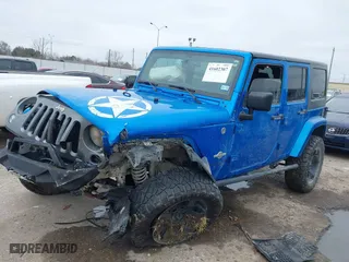 2015 Jeep Wrangler Unlimited Sport with VIN 1C4HJWDG2FL592793, listed as a IAAI auction lot 41602307 with 126,610 mi miles. Bid and sale history available at carsss.com. Image 17.