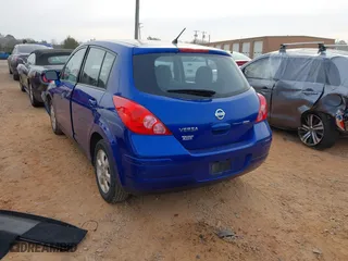 2012 Nissan Versa S with VIN 3N1BC1CP0CK239739, listed as a IAAI auction lot 41763481 with 146,605 mi miles. Bid and sale history available at carsss.com. Image 3.