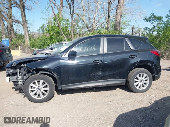 2014 Mazda CX-5 Touring z VIN JM3KE4CY4E0328880, wystawiony jako IAAI lot #42112302 z przebiegiem 185 228 mil mil oraz . Historia ofert i sprzedaży dostępna na DreamBid. Obrazek 15.