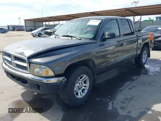 2001 Dodge Dakota z VIN 1B7HL2AX51S333575, wystawiony jako IAAI lot #41782582 z przebiegiem 291 640 mil mil oraz . Historia ofert i sprzedaży dostępna na DreamBid. Obrazek 2.