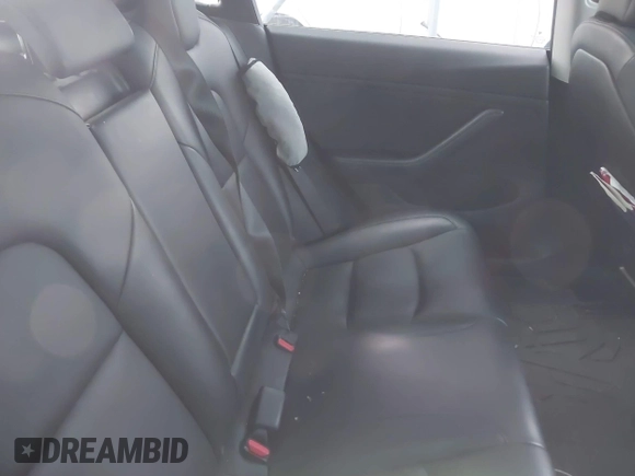 2019 Tesla Model 3 Mid Range with VIN 5YJ3E1EA6KF464615, listed as a IAAI auction lot 41306600 with 79,478 mi miles and . Bid and sale history available at DreamBid. Image 8.