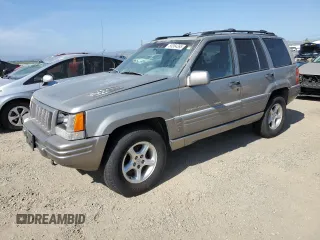 1998 Jeep Grand Cherokee Limited z VIN 1J4GZ88Z7WC120143, wystawiony jako Copart lot #55364395 z przebiegiem 201 468 mil mil oraz Czysty tytuł • Clean title. Historia ofert i sprzedaży dostępna na DreamBid. Obrazek 1.