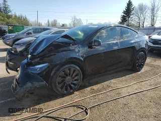2022 Tesla Model Y Performance z VIN 7SAYGDEF5NF515610, wystawiony jako Copart lot #55293995 z przebiegiem 60 115 mil mil oraz Szkoda całkowita • Salvage title. Historia ofert i sprzedaży dostępna na DreamBid. Obrazek 1.