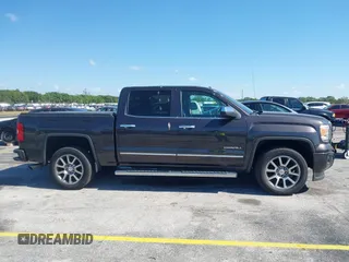 2015 GMC Sierra 1500 Denali with VIN 3GTU2WEC2FG422289, listed as a IAAI auction lot 42023170 with 165,856 mi miles and . Bid and sale history available at DreamBid. Image 14.