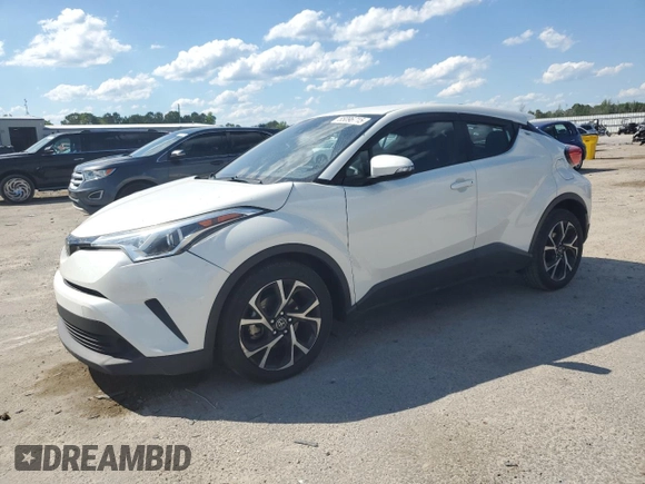 2018 Toyota C-HR XLE z VIN NMTKHMBX4JR031512, wystawiony jako Copart lot #55096715 z przebiegiem 100 522 mil mil oraz Szkoda całkowita • Salvage title. Historia ofert i sprzedaży dostępna na DreamBid. Obrazek 1.