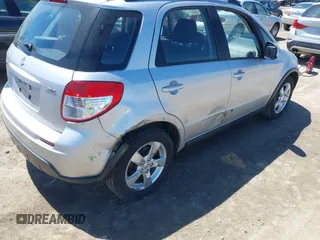 2012 Suzuki SX4 Crossover with VIN JS2YB5A36C6300510, listed as a IAAI auction lot 42140760 with 110,498 mi miles and . Bid and sale history available at carsss.com. Image 6.