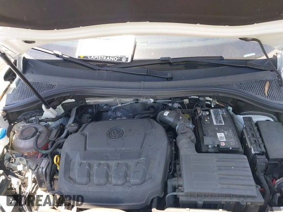 2022 Volkswagen Tiguan SE R-Line Black with VIN 3VVCB7AX3NM073218, listed as a IAAI auction lot 42254388 with 31,998 mi miles and . Bid and sale history available at DreamBid. Image 10.