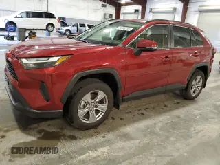 2022 Toyota RAV4 XLE with VIN JTMP1RFV9ND089960, listed as a Copart auction lot 61803735 with 24,382 mi miles and Salvage title. Bid and sale history available at DreamBid. Image 1.