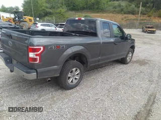 2020 Ford F-150 XL with VIN 1FTFX1E58LFB70690, listed as a IAAI auction lot 42131900 with 168,571 mi miles and . Bid and sale history available at DreamBid. Image 4.
