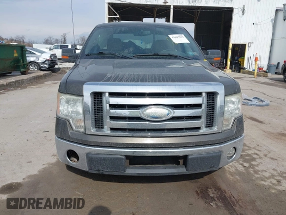 2009 Ford F-150 XL with VIN 1FTPF12V79KC35637, listed as a IAAI auction lot 41645222 with 169,114 mi miles. Bid and sale history available at carsss.com. Image 6.