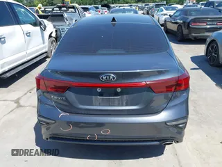 2021 Kia Forte LXS z VIN 3KPF24ADXME356322, wystawiony jako IAAI lot #42237624 z przebiegiem 52 609 mil mil oraz . Historia ofert i sprzedaży dostępna na DreamBid. Obrazek 16.