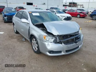 2008 Toyota Avalon XL z VIN 4T1BK36B38U309930, wystawiony jako IAAI lot #41748524 z przebiegiem 164 010 mil mil oraz . Historia ofert i sprzedaży dostępna na DreamBid. Obrazek 1.