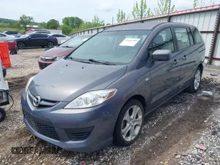 2009 Mazda 5 Touring with VIN JM1CR29LX90333914, listed as a IAAI auction lot 42101304 with 129,470 mi miles. Bid and sale history available at carsss.com. Image 2.