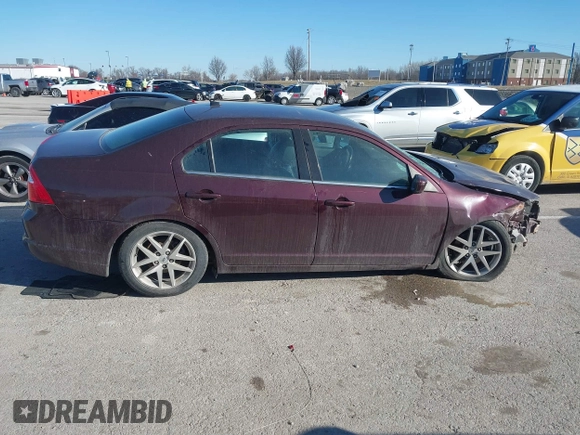 2012 Ford Fusion SEL z VIN 3FAHP0JA7CR302871, wystawiony jako IAAI lot #41694603 z przebiegiem 104 104 mil mil oraz . Historia ofert i sprzedaży dostępna na DreamBid. Obrazek 13.