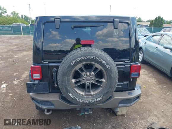 2017 Jeep Wrangler Unlimited Sahara with VIN 1C4BJWEGXHL520182, listed as a IAAI auction lot 42616692 with 88,169 mi miles and . Bid and sale history available at DreamBid. Image 17.
